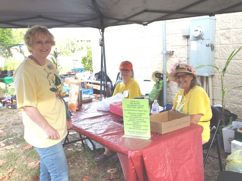March in the Park 2022 garden club of cape coral members at checkout booth