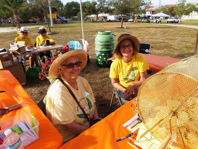 March in the Park 2022 garden club of cape coral members at raffle table