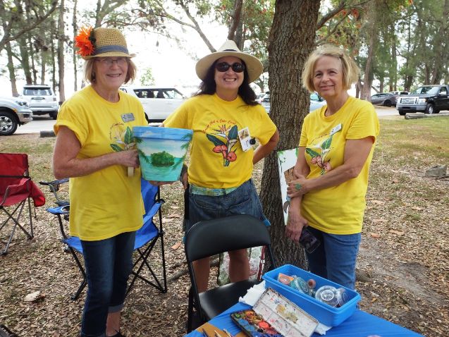 March in the Park 2022 garden club of cape coral members with painted plant pot