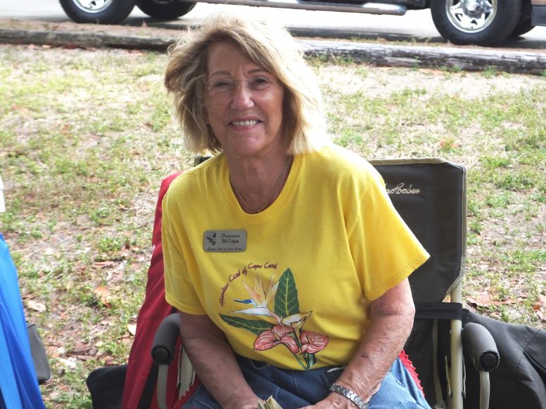 March in the Park 2022 garden club of cape coral member resting