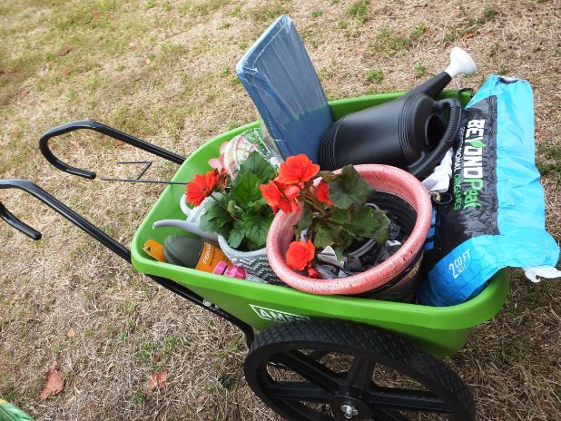 March in the Park 2022 garden club of cape coral raffle prize wheel barrow filled with garden supplies
