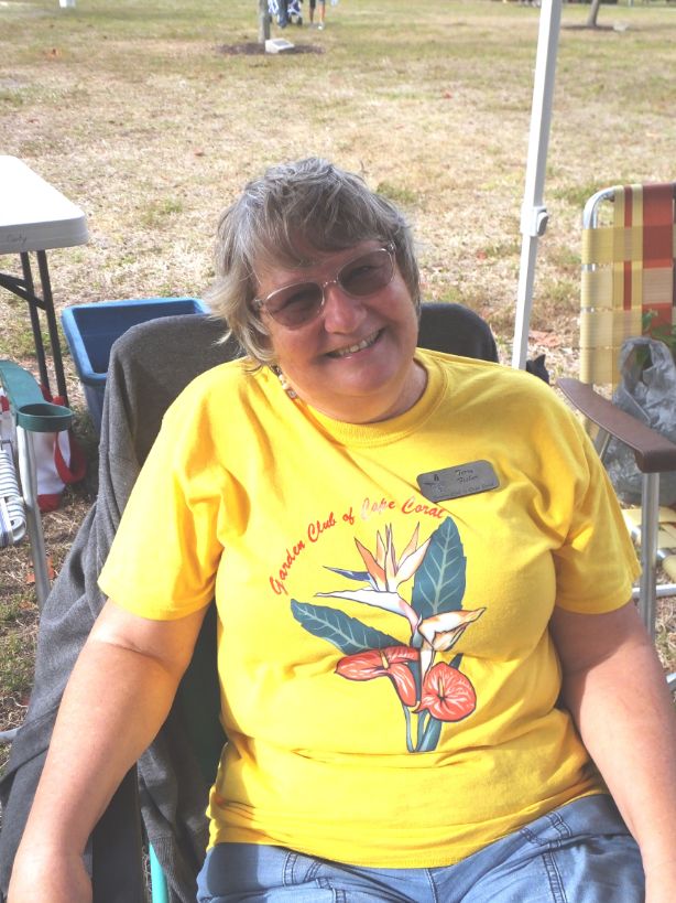 March in the Park 2022 garden club of cape coral garden club member resting in the shade