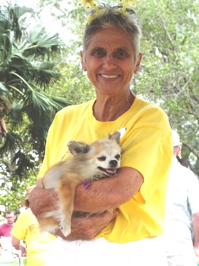 March in the Park 2022 garden club of cape coral member with cute puppy