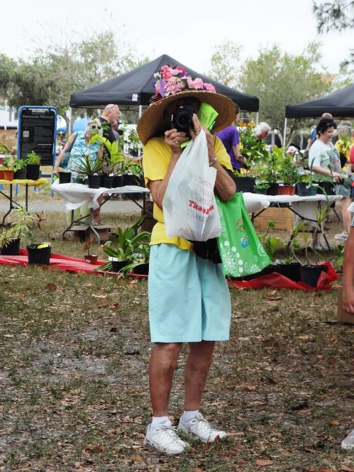 March in the Park 2022 garden club member with flowered hat